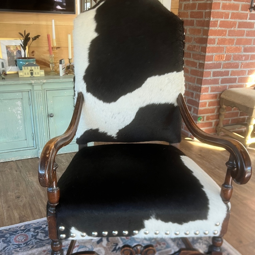 Two cowhide chairs